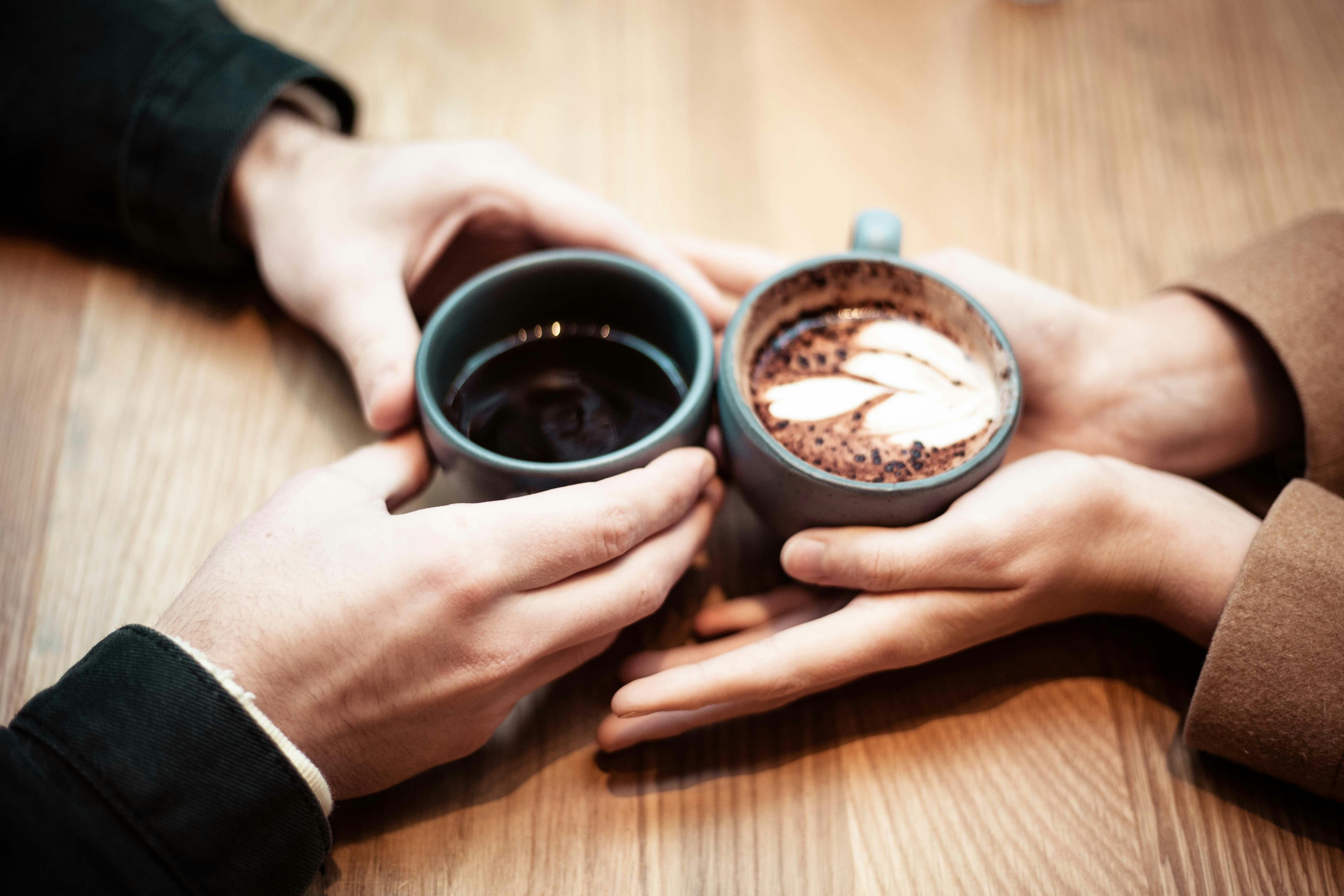 Couple sharing a quiet morning moment over coffee