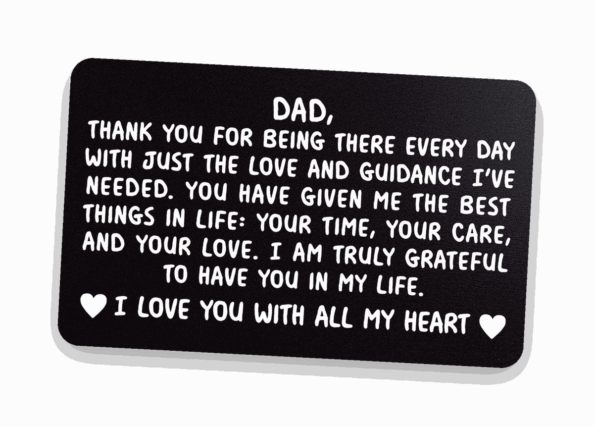 Black engraved 'I Love You With All My Heart, Dad' metal wallet card on warm linen — Father's Day keepsake gift