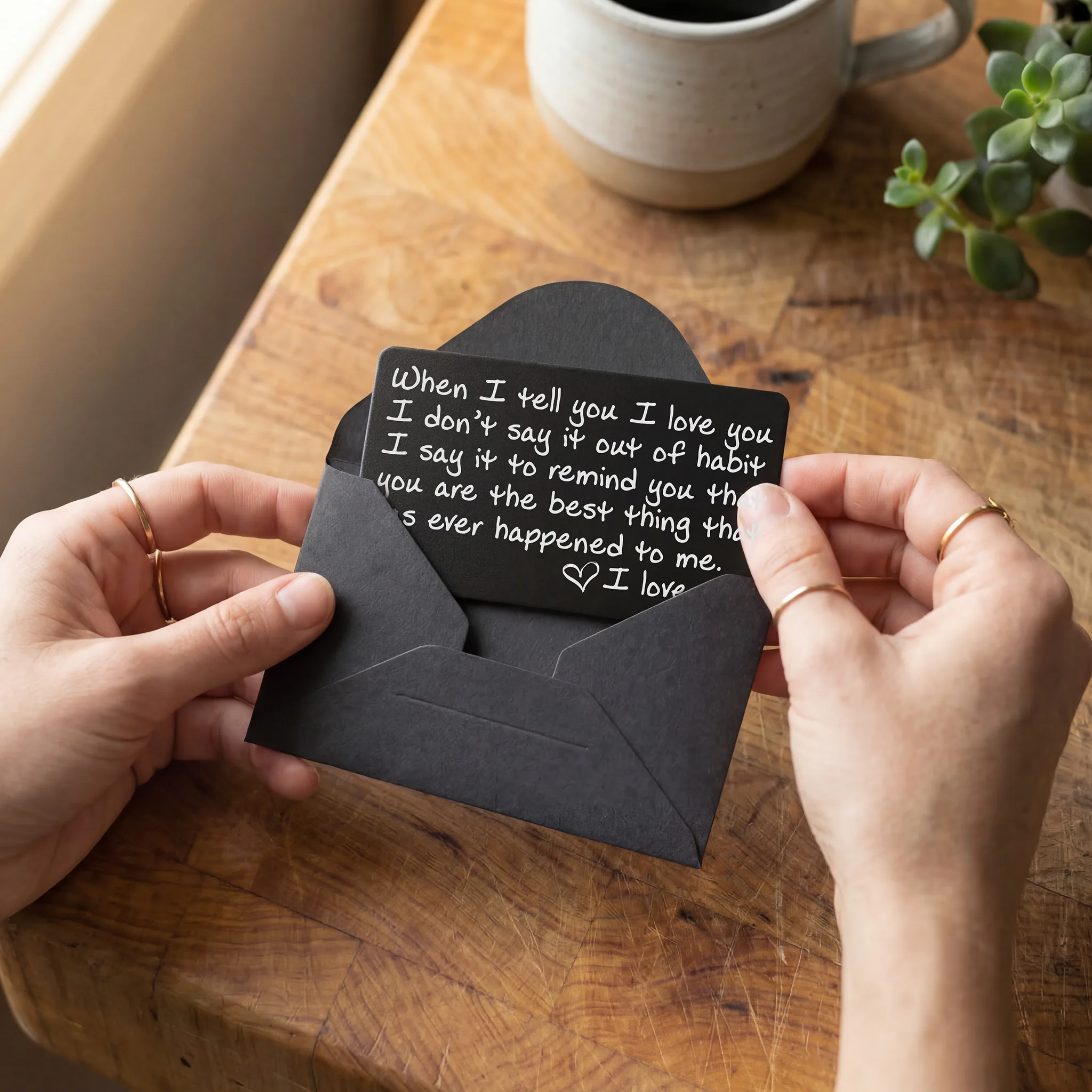 Engraved love note wallet card in kraft gift packaging, ready to give